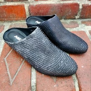 Antelope black leather mules.